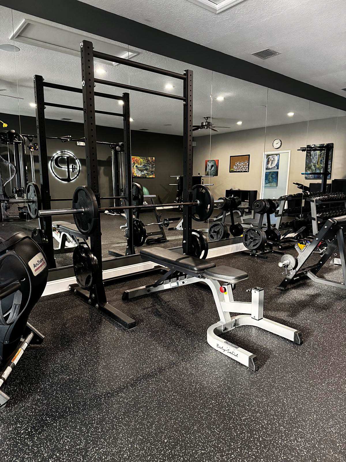 Squat rack and benches on the Platinum training floor